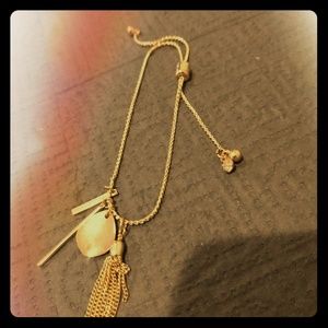 Dainty Gold Pull Through Bracelet with Tassel.